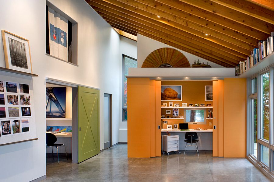 Sliding doors tuck away the home office when not in use