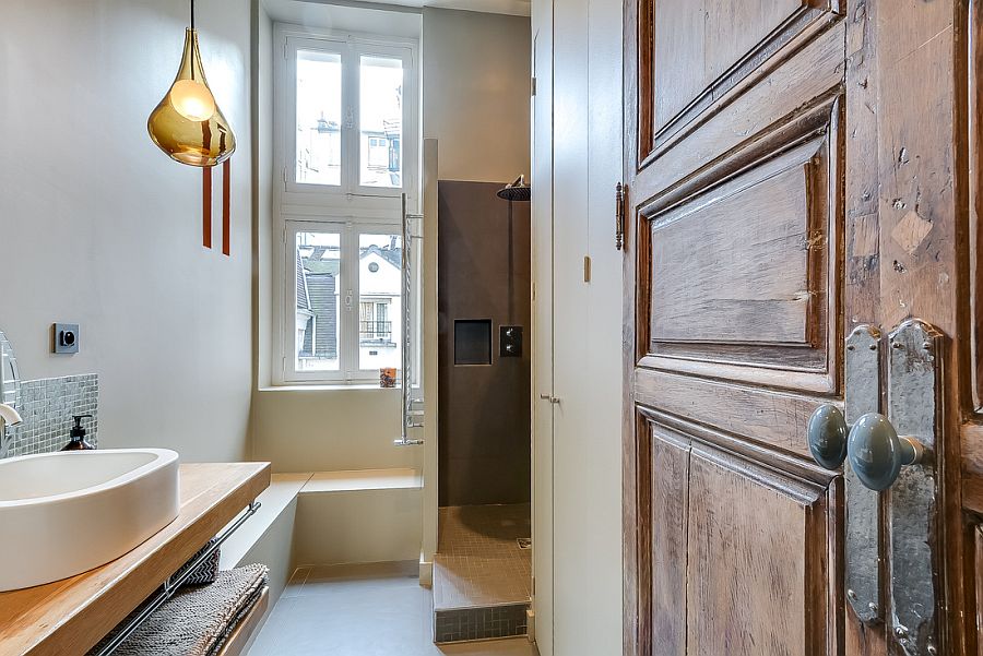 Small bathroom design idea with a corner shower space