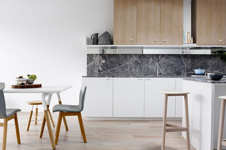 Smart kitchen backsplash adds a contrasting texture and hue to the kitchen