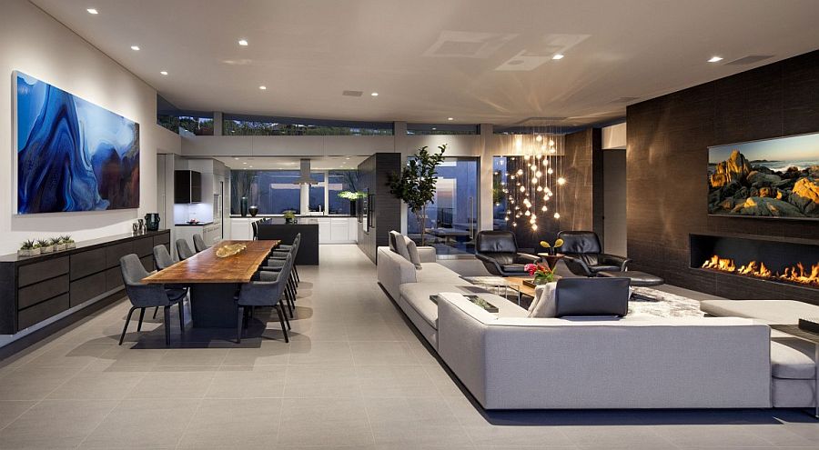 Sparkling cascading chandelier lights up the living area