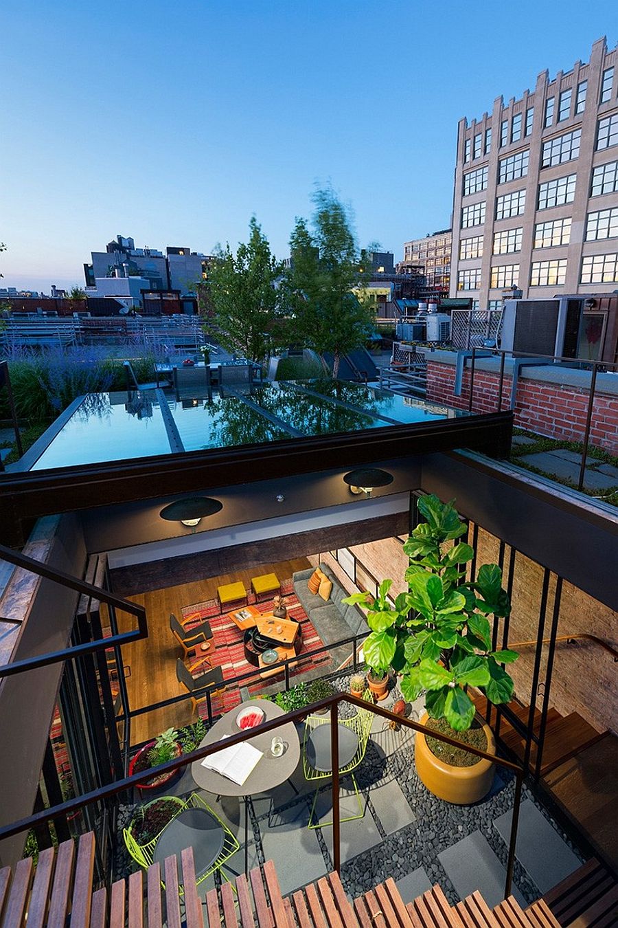 Sunken courtyard inside the transformed loft brings in ample light