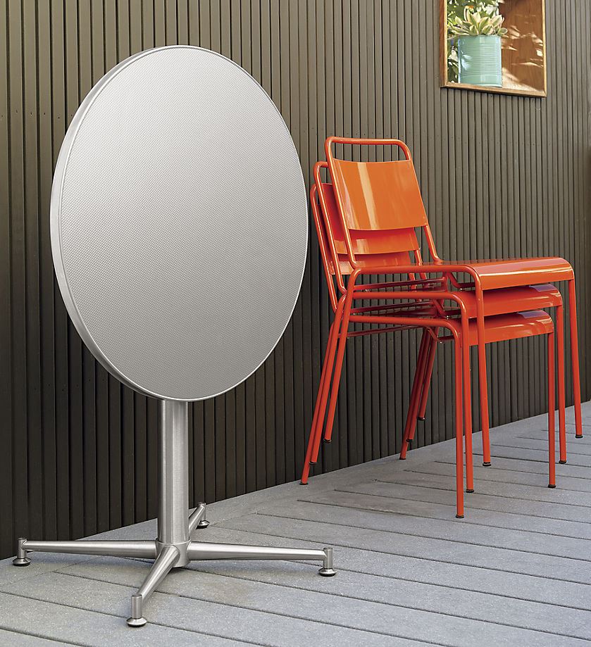 Vivid orange stacking chairs from CB2