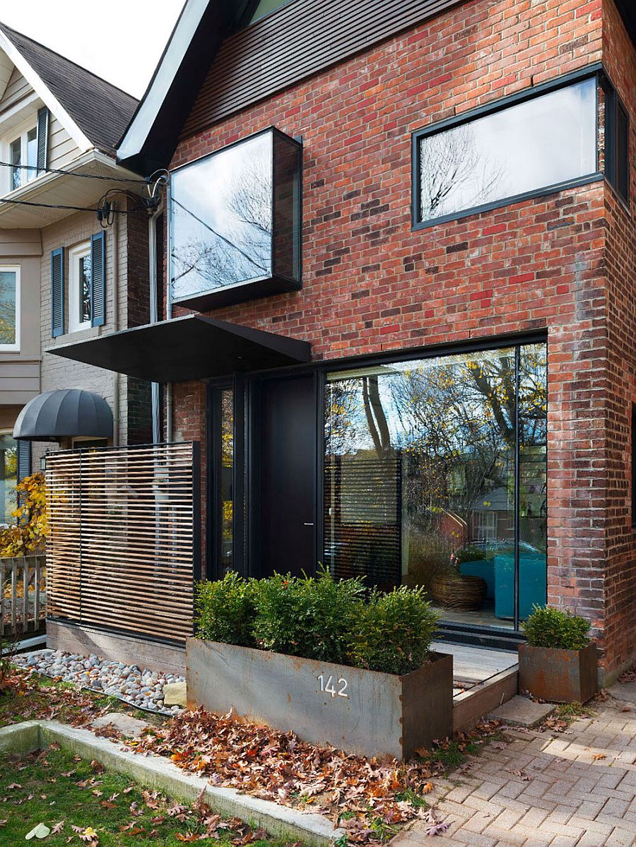 Brick and glass exterior of the renovated Toronto home