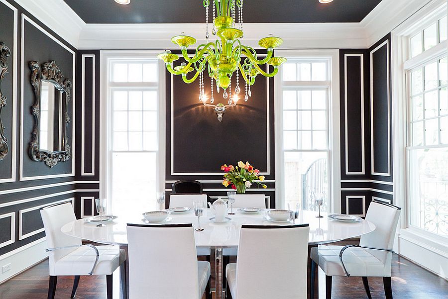 Ceiling adds to the beauty of the dashing dining room in black and white