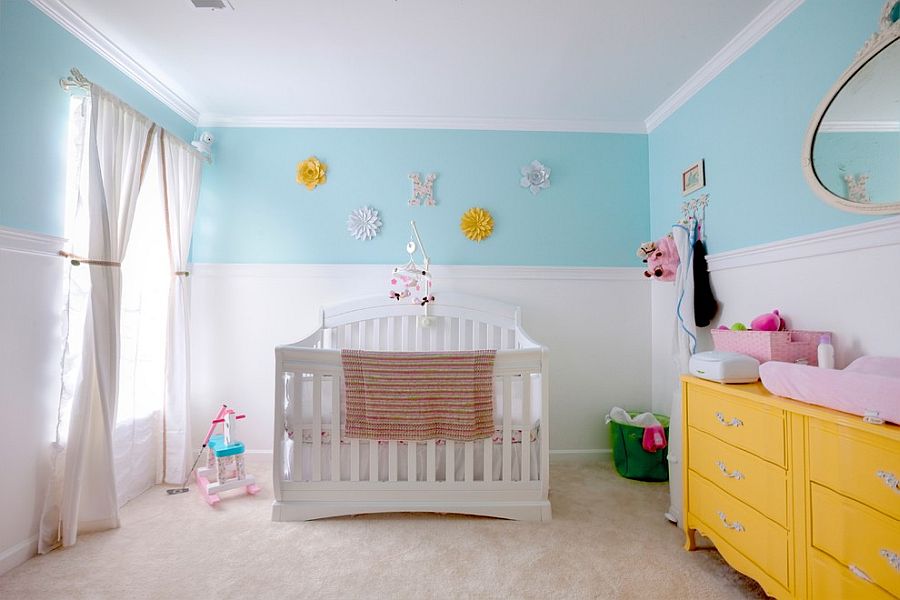 yellow and pink baby room