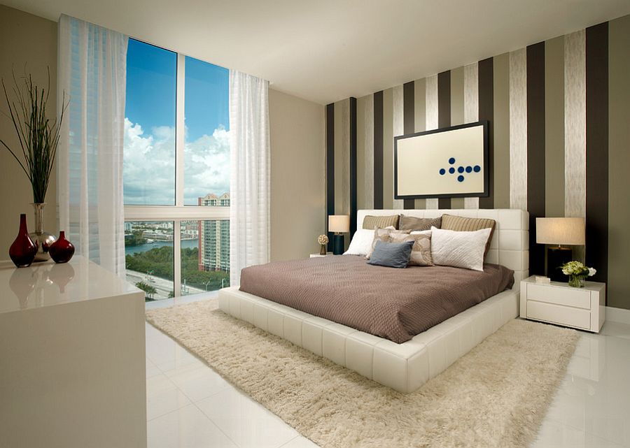 Contemporary bedroom with wonderful view of Miami skyline [Design: Zelman Style Interiors]