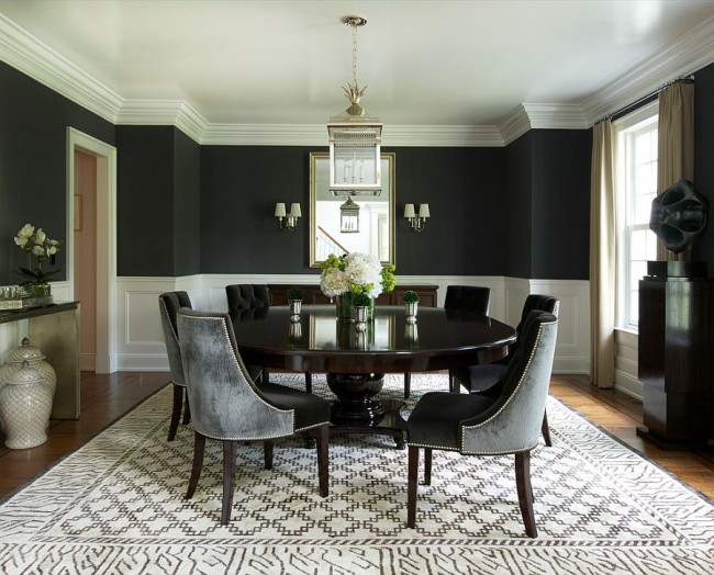 black dining room features wall
