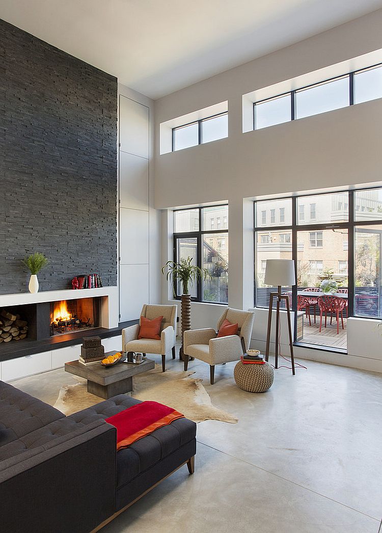 Custom fireplace with warm stone texture in the living room