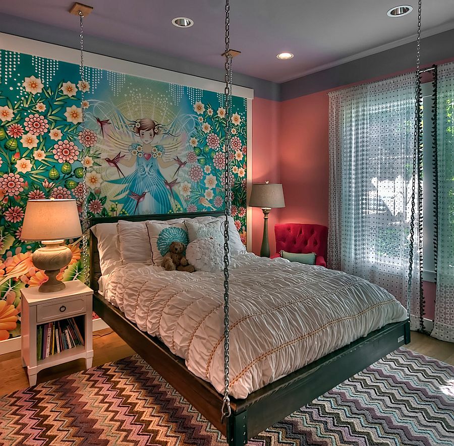 Custom wall mural and hanging bed create an ingenious girls' bedroom [Design: Tamara Rosenbloom Design]