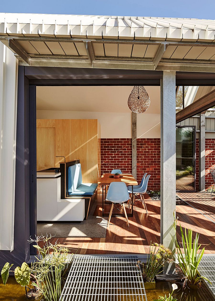 Dining space of the home has a restaurant vibe with plenty of natural light