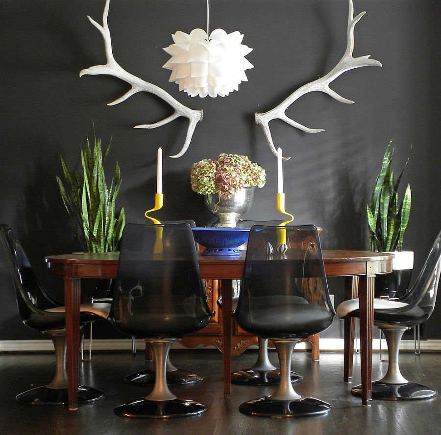 Eclectic dining room with dark, refined appeal