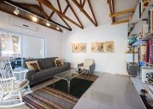 Exposed-wooden-beams-add-a-touch-of-timeless-charm-to-the-living-area-217x155