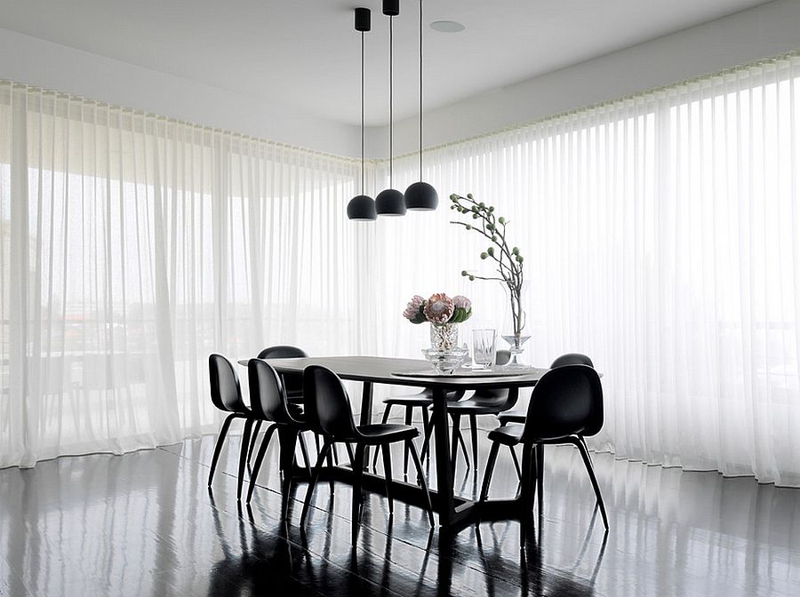 Fascinating dining room design dips into the beauty of black [Design: Luigi Rosselli Architects]