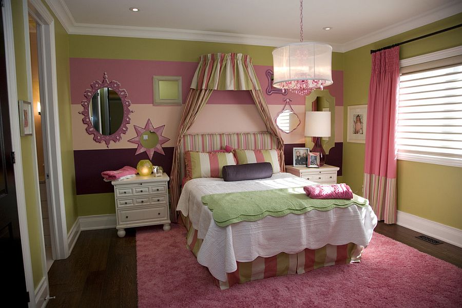 Girls' bedroom with a striped accent wall [Design: Jennifer Brouwer Design Inc]