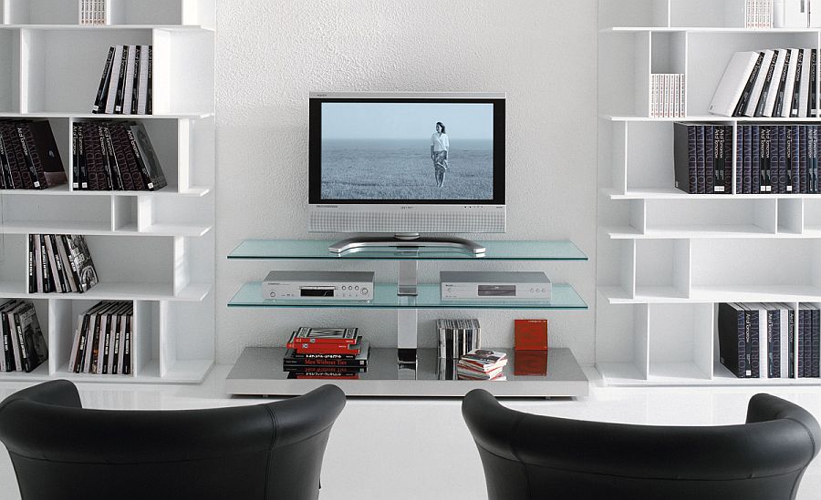 Gorgeous TV unit with glass shleves flanked by bookshelves