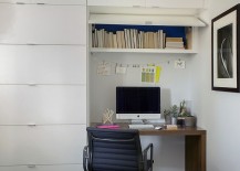 Home-office-with-ample-shelf-space-and-small-workstation-217x155
