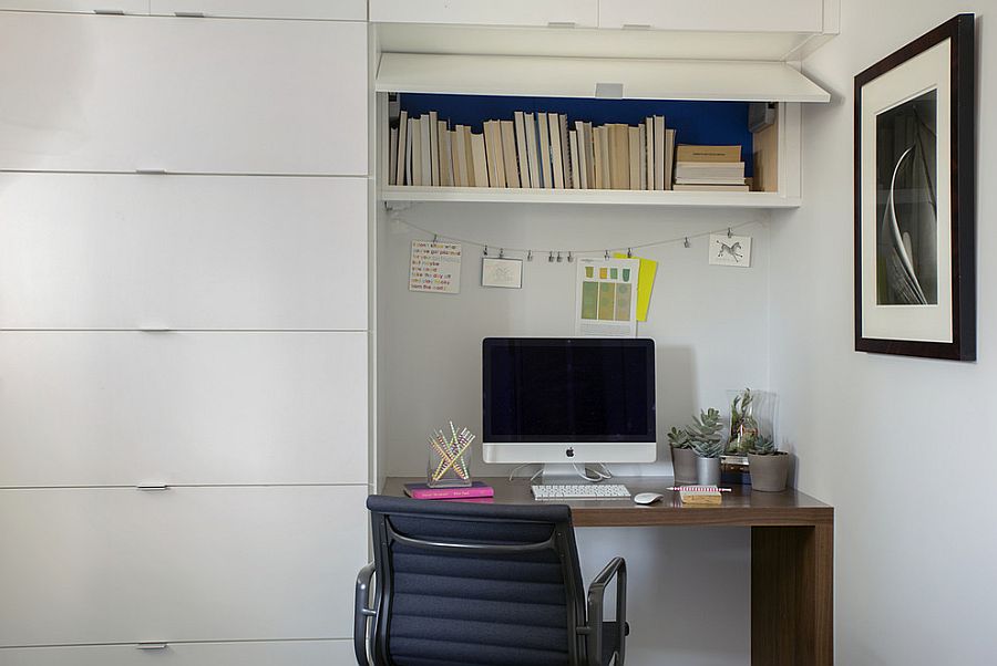 Home office with ample shelf space and small workstation