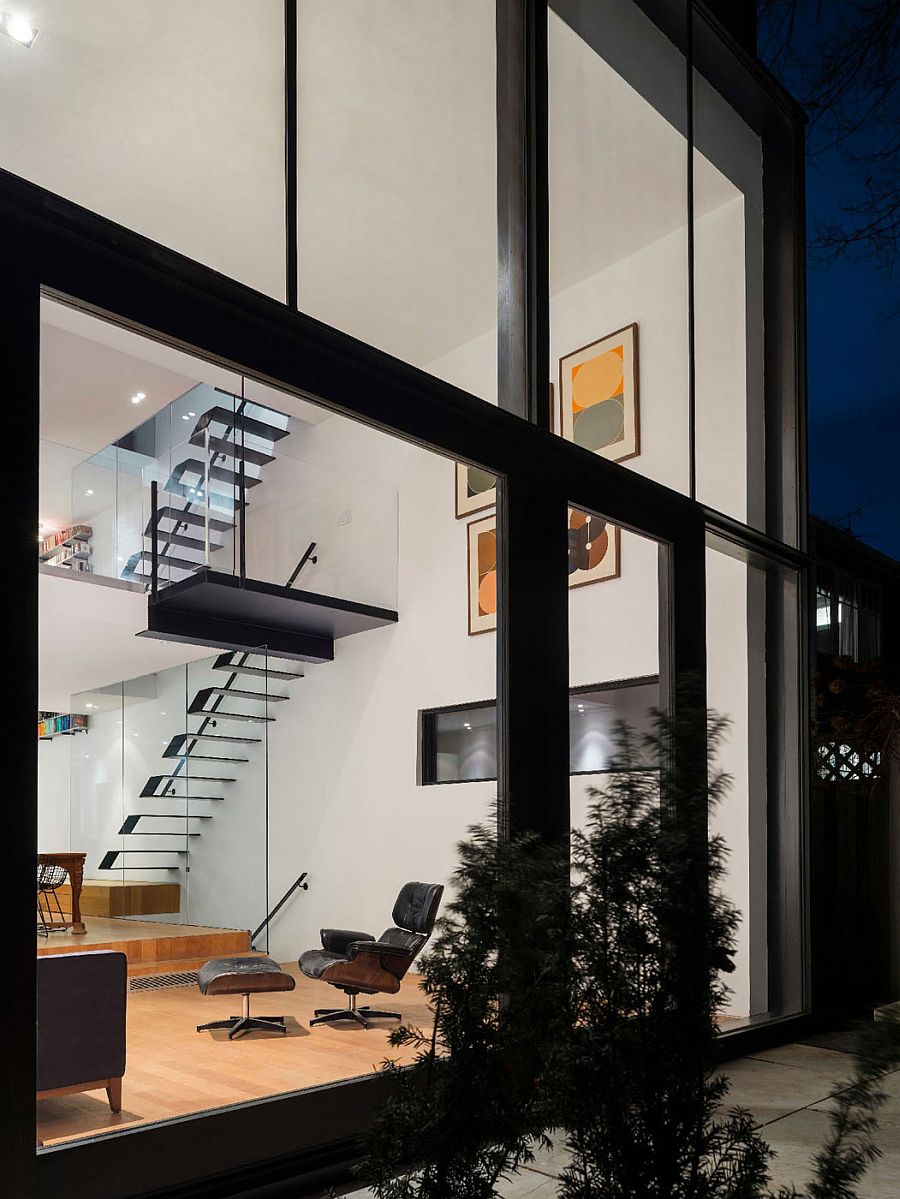 Large glass extension adds to the living area of the 1900s home