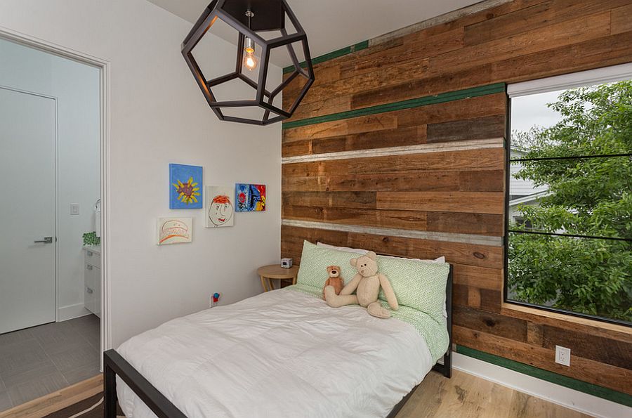 Natural materials help shape a relaxed ambiance inside the kids' room [Design: Cornerstone Architects]