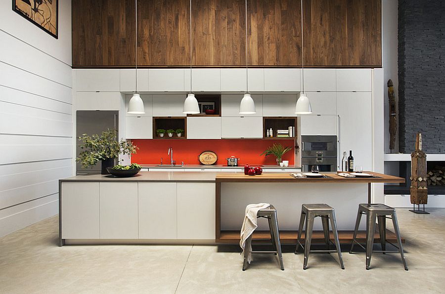 Orange adds a hint of excitement to the trendy kitchen