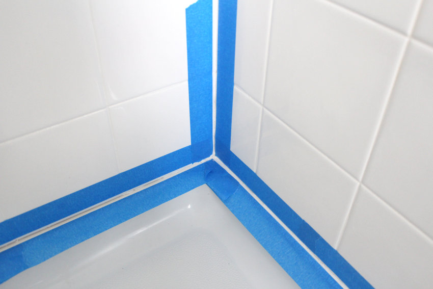 Painter's tape adds precision to the caulking process