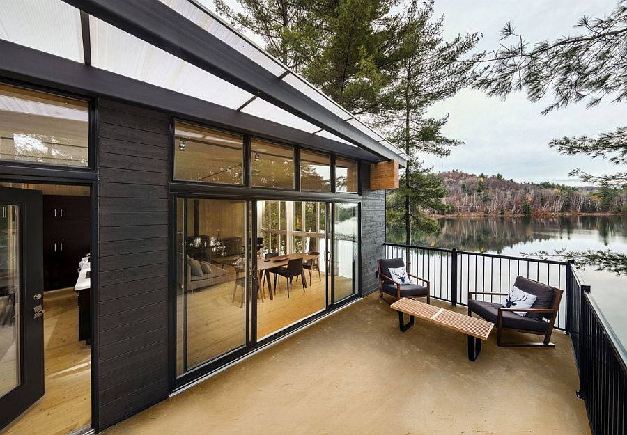 Private deck of the cottage overlooking the tranquil lake