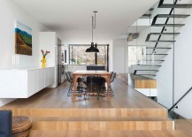 Raised-wooden-platform-seperates-the-dining-and-kitchen-areas-from-the-entry-217x155
