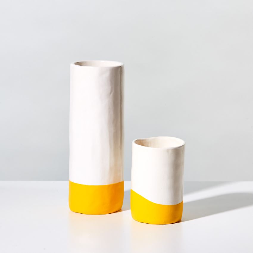 Rubber dipped yellow and white vase from Room & Board