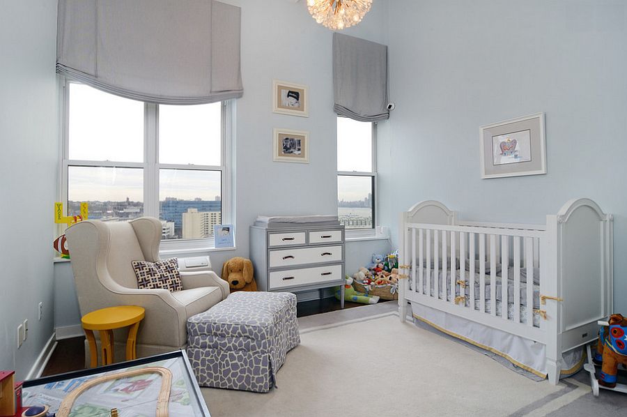 Simple light blue backdrop gives the nursery a tranquil look [Design: Hudson Place Realty]