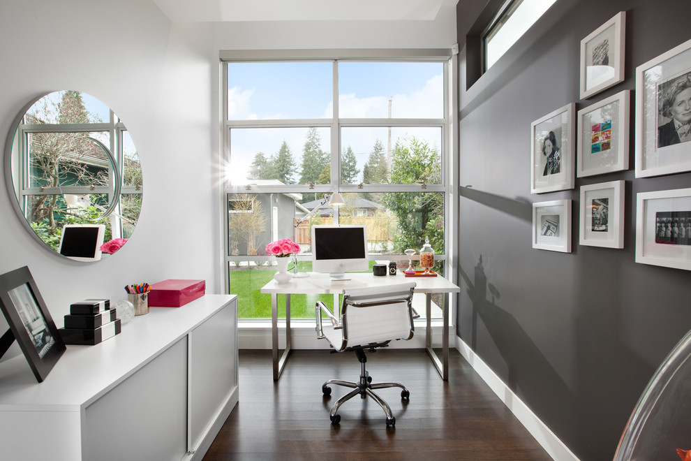 Small home office with a cool, gray wall