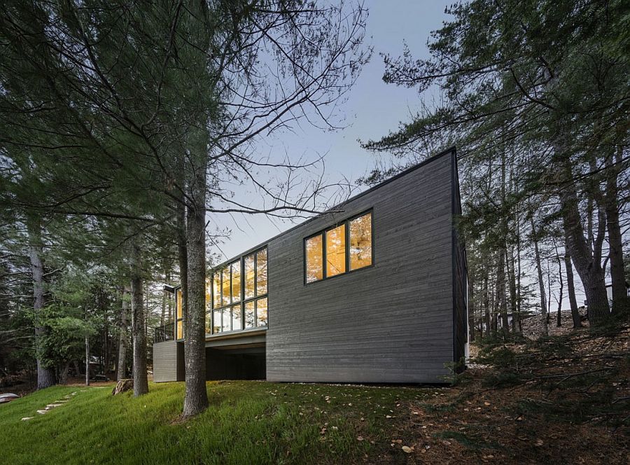 Smart exterior of the cabin blends visuall with the landscape around it