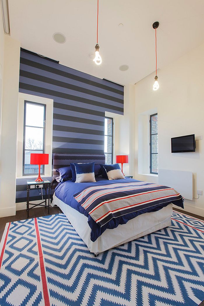 Snazzy use of stripes in the contemporary bedroom in London [From: Joel Antunes photography]