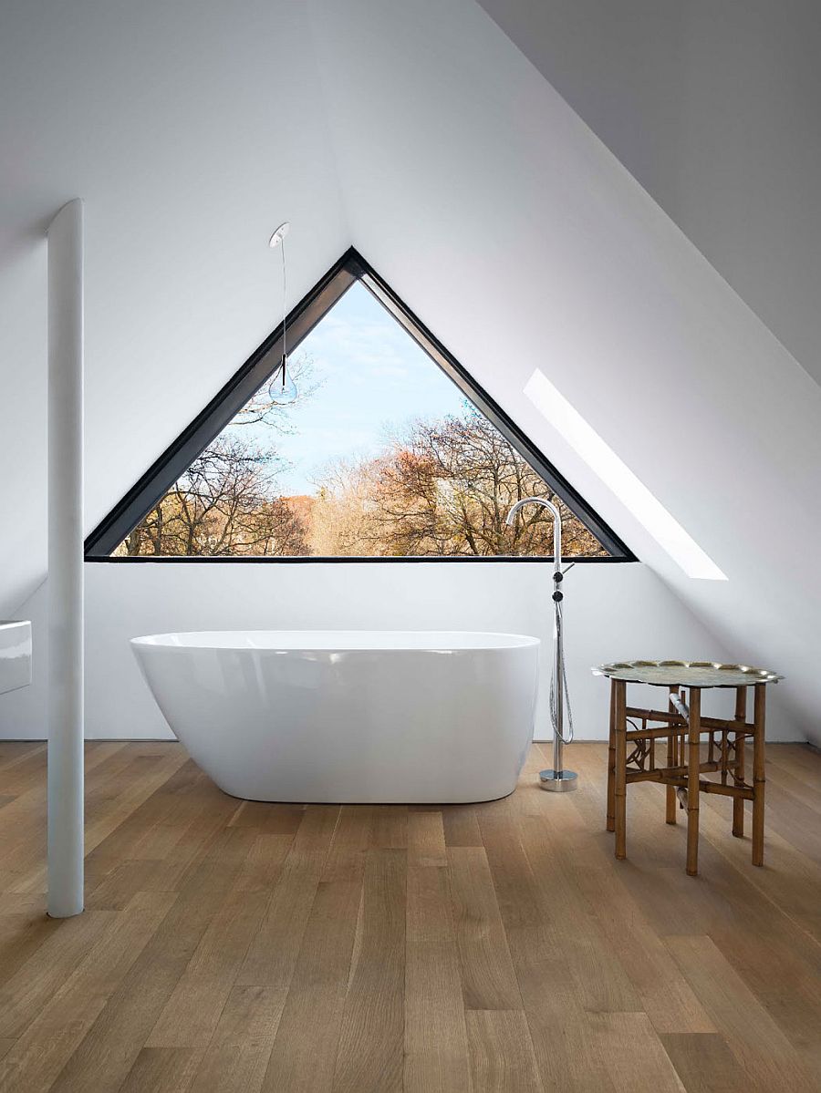 Standalone bathtub in the attic bathroom