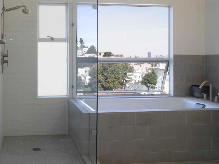 Tiled tub in a modern bathroom