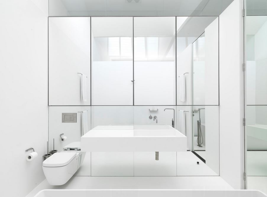 Ultra-modern bathroom with a mirrored wall