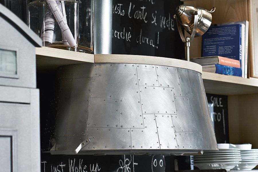 Unique hood of the kitchen worktop is inspired by world war II war plane grills