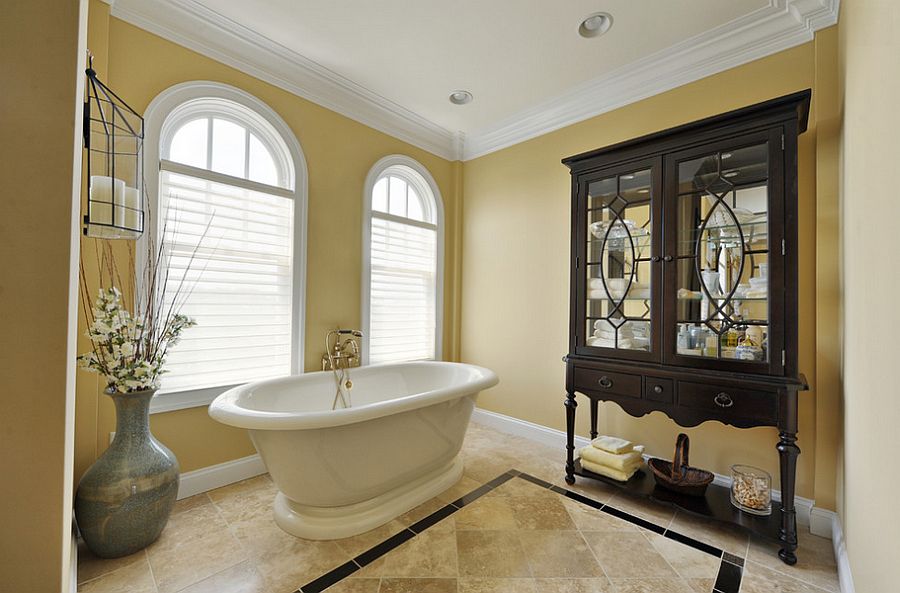 Use yellow to create a lovely backdrop for your traditional bathroom [Design: Echelon Custom Homes]