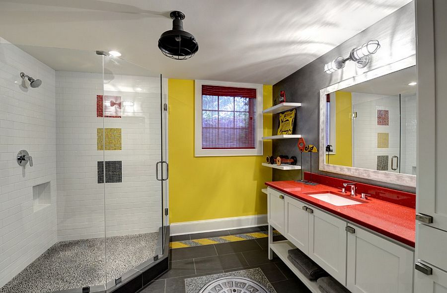 Yellow brings visual brightness to the posh gray bathroom [Design: The Consulting House]