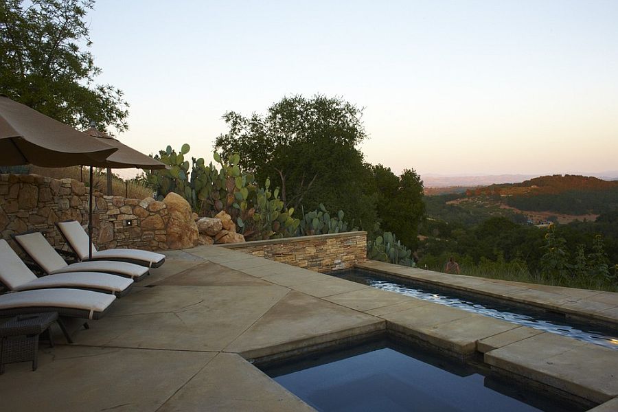 Aging concrete deck adds a new dimension and hue to the pool area [Design: Jeffrey Gordon Smith Landscape Architecture]