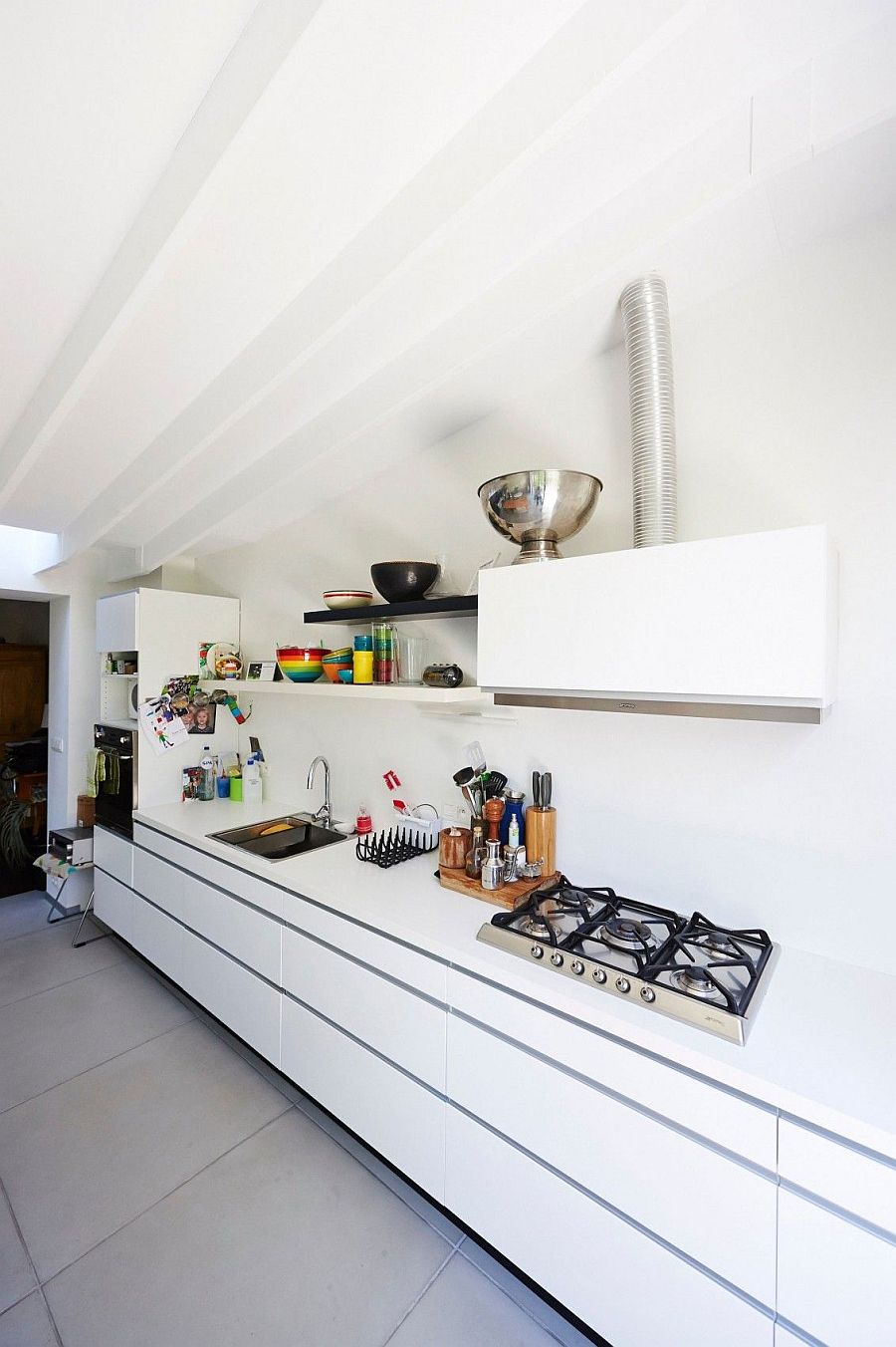 All-white kitchen workstation with a hint of black