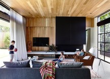 American-oak-wall-and-ceiling-adds-warmth-to-the-living-area-217x155