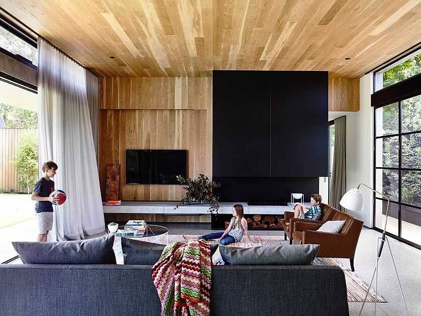 American oak wall and ceiling adds warmth to the living area