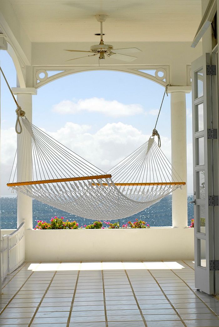 Beach style porch with hammock overlooking the ocean