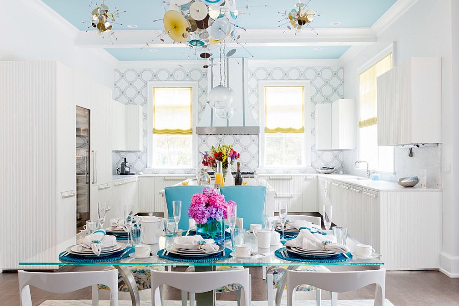 Blue ceiling adds to the appeal of the exquisite contemporary dining space [Photography: Rikki Snyder]