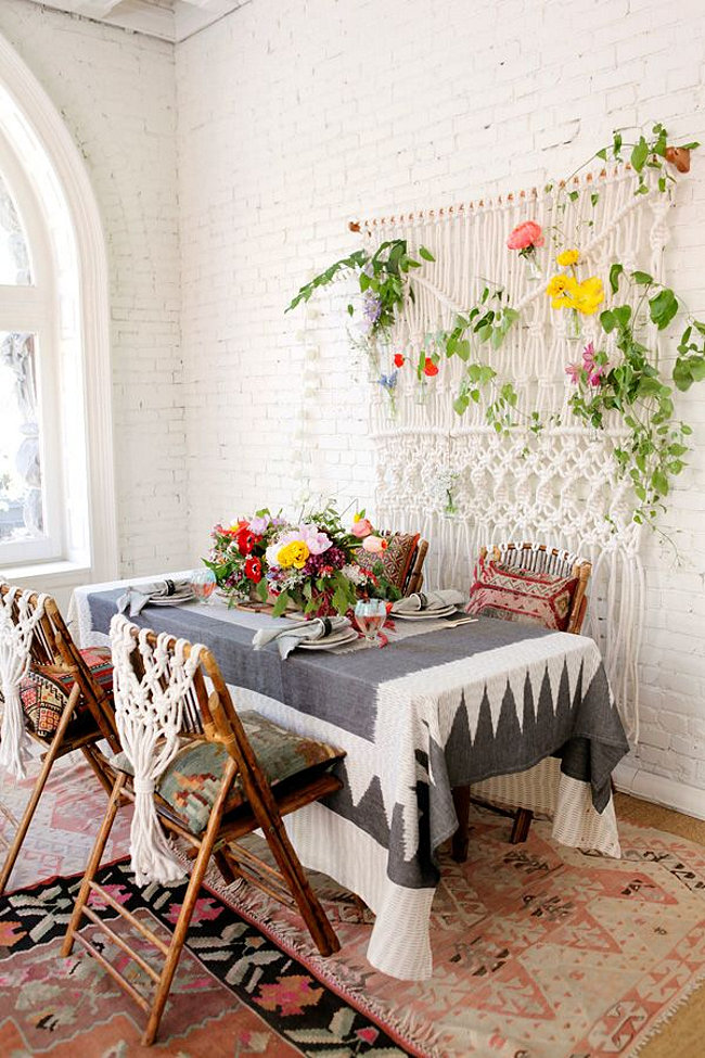 Boho dining room with a macrame wall hanging