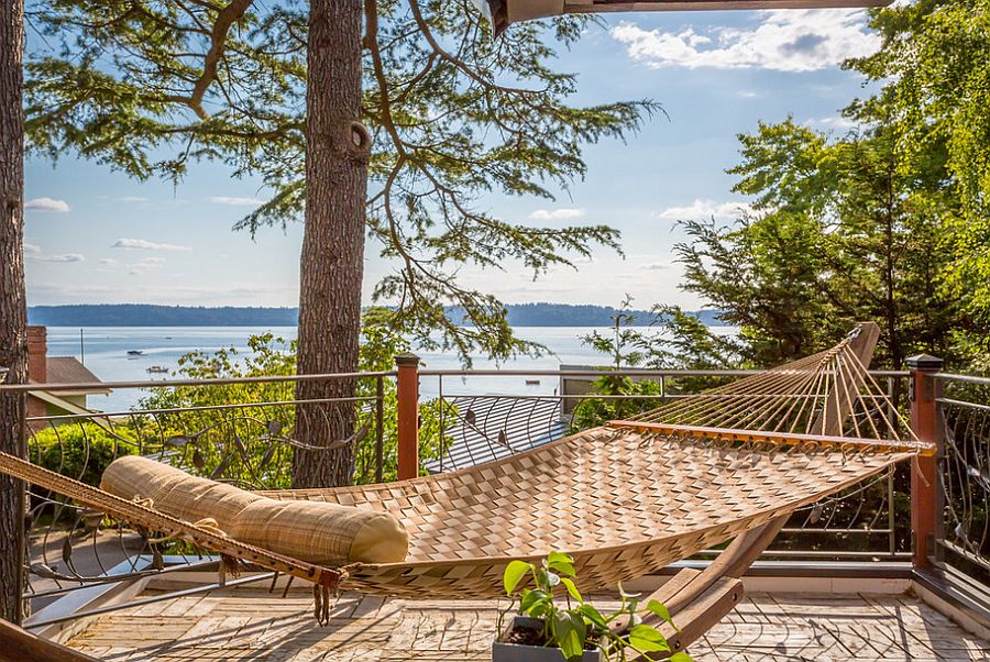 Braided hammock brings tropical flavor to the beach style deck [From: Cassie Daughtrey Realogics Sotheby's Realty]