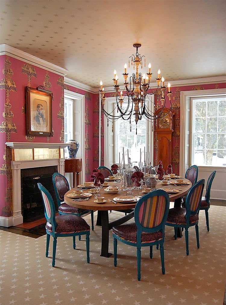 Ceiling wallpaper enhances the luxurious look of the dining room