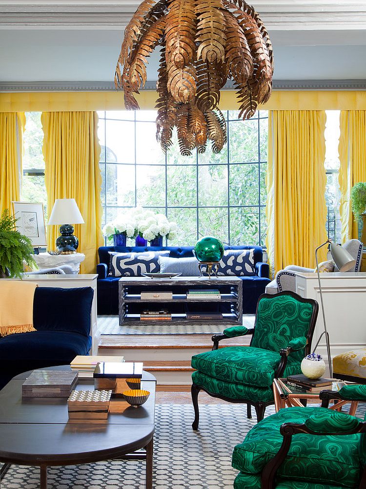 Chairs covered in malachite fabric steal the show in this eclectic living room [Design: Amanda Nisbet Design]