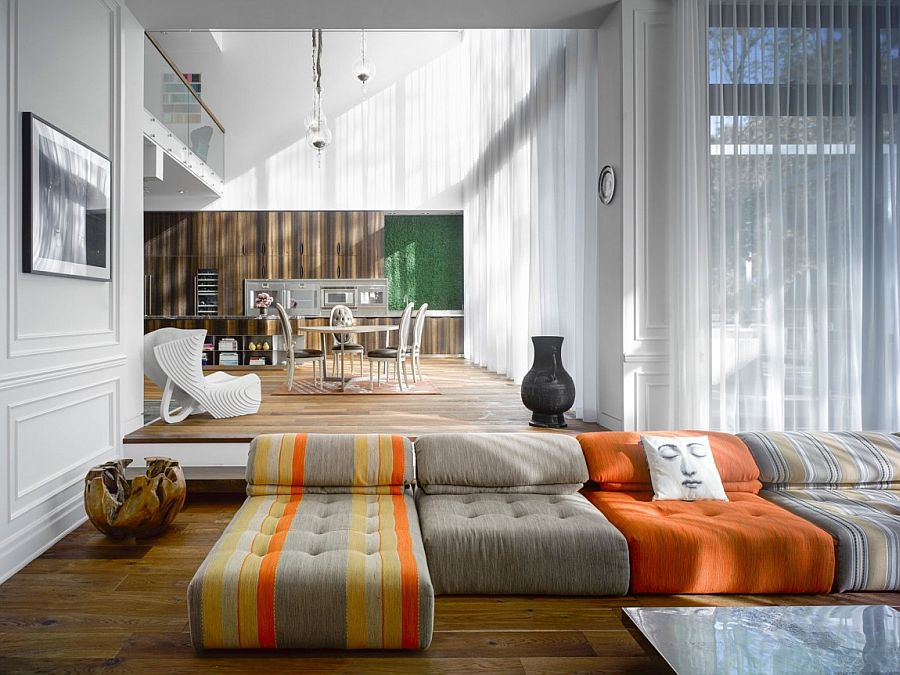 Colorful couch creates an informal, playful ambiance