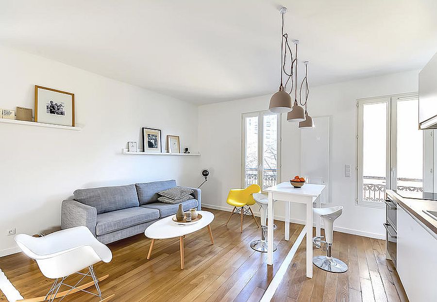 Eames chair adds a touch of yellow to the living area